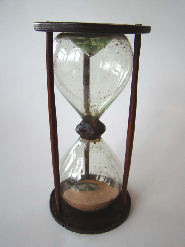 A rare 18th century sand glass with one minute duration